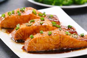 salmon on a plate with sauce